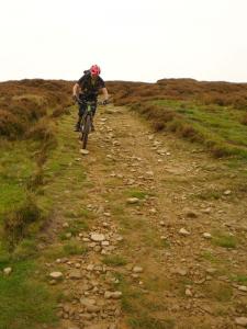 Brian on the loose rocks of the Wimble Holme Hill descent.